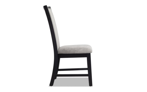 Contemporary Cosmopolitan Gray & Black Solid Back Upholstered Dining Chair with velvet fabric, memory foam seat, and rubberwood frame.