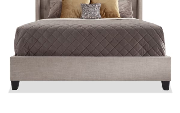 Emerson King Beige Upholstered Panel Bed with taupe polyester fabric, button-tufted high headboard, winged accents, and low-profile footboard in transitional style.