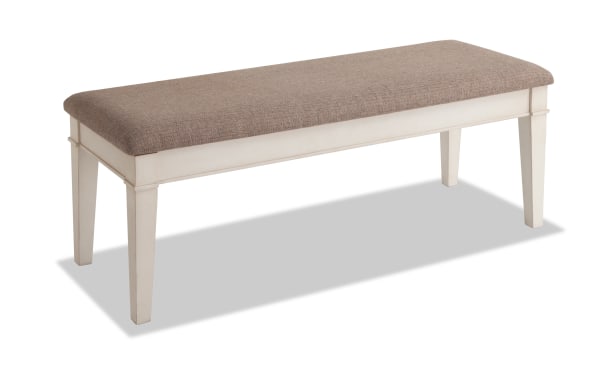 Montana White & Beige Upholstered Storage Dining Bench with rustic white rubberwood frame, beige polyester fabric seat, and hidden storage.