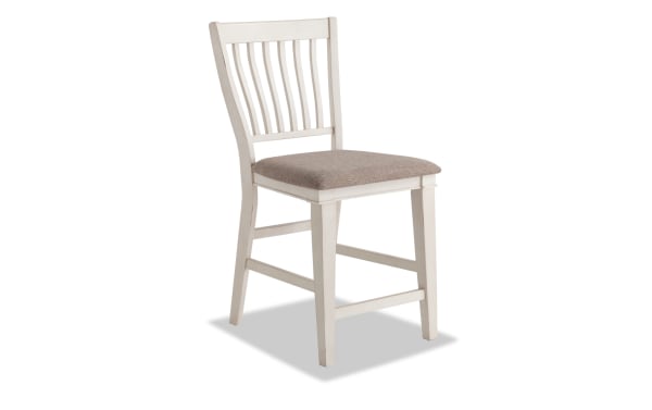 Montana White & Beige Slat Back Counter Height Stool with rustic white rubberwood frame, beige polyester fabric seat, and traditional slat back design.