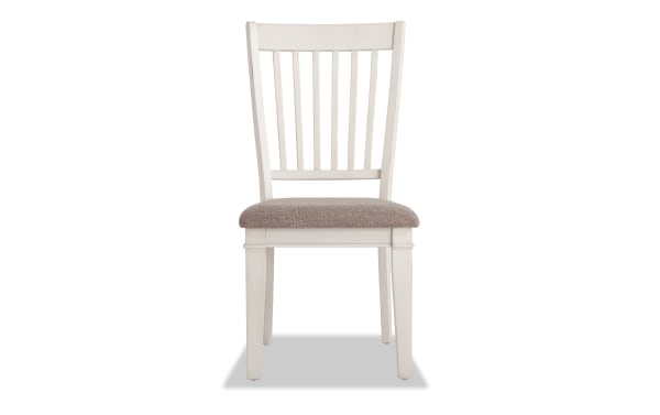 Montana White & Beige Slat Back Upholstered Dining Chair with rustic white rubberwood frame, beige polyester fabric seat, and traditional slat back design.