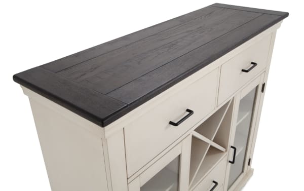 Montana White & Espresso 4 Drawer Server from Montana Dining collection, rustic style with rubberwood, oak veneer, tempered glass, two felt-lined drawers, glass cabinets, and removable wine racks.