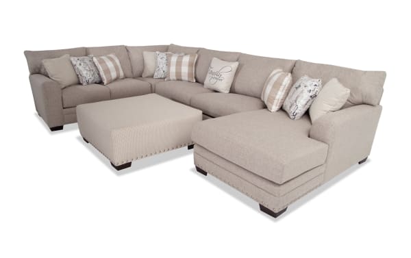 Cottage Chic Beige 150'' 4-piece right arm facing chaise sectional with ottoman, traditional style, beige polyester fabric, nailhead accents, includes 10 patterned and text pillows.