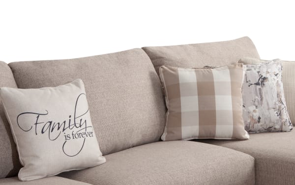 Beige Cottage Chic 4-piece right arm facing sleeper chaise sectional with plush polyester fabric, decorative accent pillows, and traditional style upholstery.