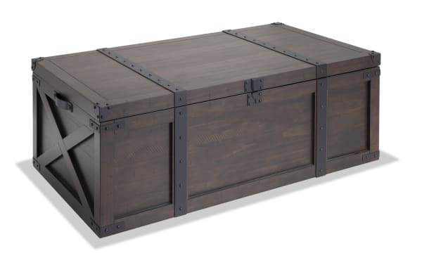 Rustic Montana Brown Storage Trunk Coffee Table from Montana Entertainment & Occasional collection, featuring distressed wood, dark metal hardware, and wire-brushed top.
