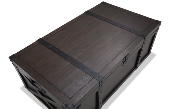 Rustic Montana Brown Storage Trunk Coffee Table from Montana Entertainment & Occasional, made of wood with dark metal hardware and distressed finish.