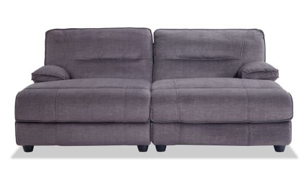 Pacifica Gray 82" power reclining dual chaise in gray polyester fabric with plush cushions and brushed microfiber, transitional style.