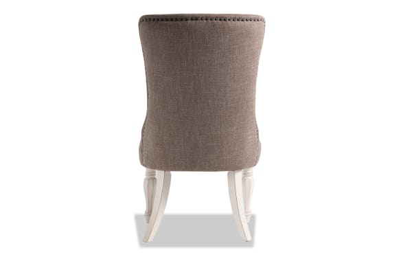 Beige Scarlett White & Beige Solid Back Upholstered Dining Chair with carved white legs, polyester fabric, cottage style from Scarlett Dining collection.
