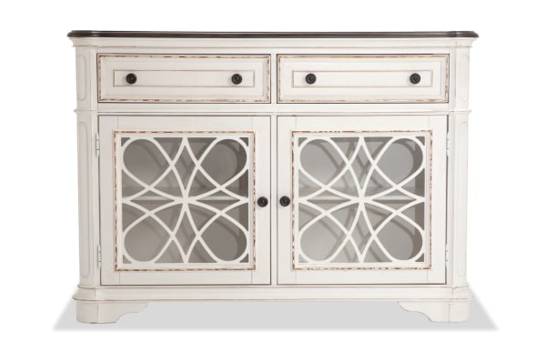 Scarlett White & Oak 2 Drawer Server from Scarlett Dining collection, cottage style with distressed antique white polar solids, oak veneers, tempered glass, antique brass hardware, two drawers, and decorative cabinet doors.