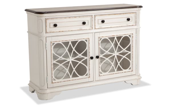 Scarlett White & Oak 2 Drawer Server from Scarlett Dining collection, cottage style with distressed antique white polar solids, oak veneer top, tempered glass doors with decorative lattice, antique brass hardware, ample storage with two drawers and cabinet shelves.