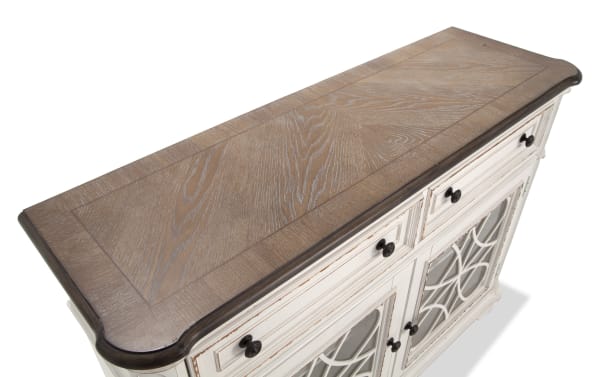 Scarlett White & Oak 2 Drawer Server from Scarlett Dining collection, cottage style with distressed antique white polar solids, oak veneer top, tempered glass doors, antique brass hardware, and decorative cabinet door design.