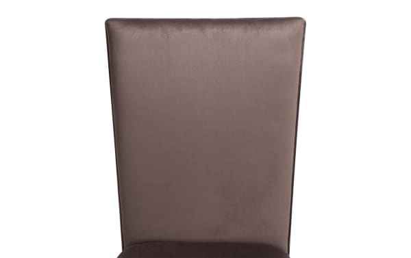 Chocolate velvet upholstered dining chair from the Cosmopolitan Dining collection, featuring a solid back and espresso-finished wooden legs.