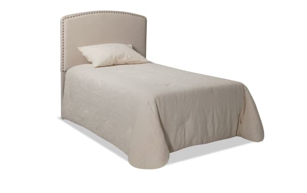 Isabella Twin Beige Upholstered Panel Headboard in transitional style with arched top and nailhead trim, made of beige polyester fabric.