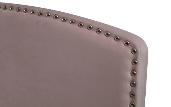 Isabella Twin Pink Upholstered Panel Headboard in soft pink polyester fabric with arched top and silver nailhead trim, transitional style.