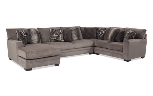 Luxe Gray 150'' 4-piece left arm facing sleeper chaise sectional in soft gray polyester fabric, transitional style with gel memory foam mattress and patterned accent pillows.
