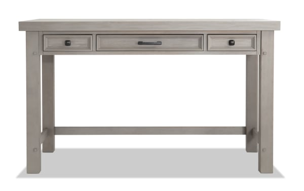 Hudson Gray 3 Drawer Desk in transitional style with rustic gray finish, rubberwood and pine solids, pewter hardware, and pullout keyboard drawer.
