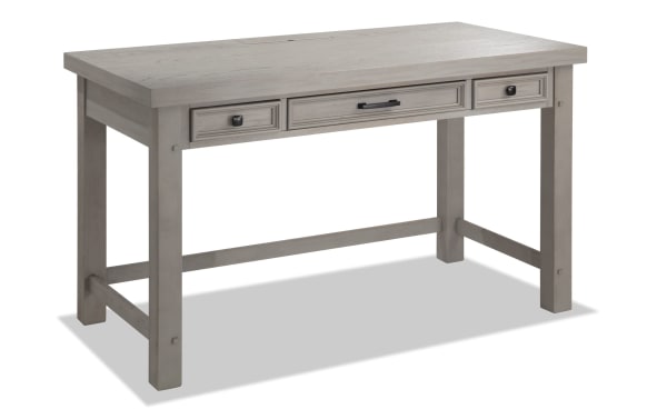 Hudson Gray 3 Drawer Desk in transitional style with rustic gray finish, rubberwood and pine solids, pewter hardware, and pullout keyboard tray.