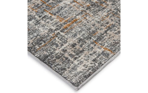 Contemporary Griffith 5' x 8' Cement Abstract Rug in gray, white, and gold with a textured polypropylene fabric and multi-color abstract pattern.
