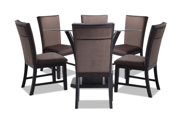 Cosmopolitan 7 Piece Round Dining Set with chocolate velvet upholstered chairs, tempered glass top, and espresso-finished rubberwood base.