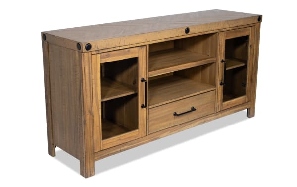 Rustic Sonoma 60" natural wood TV stand with acacia veneers, glass cabinet doors, black hardware, open shelves, and center drawer for storage.