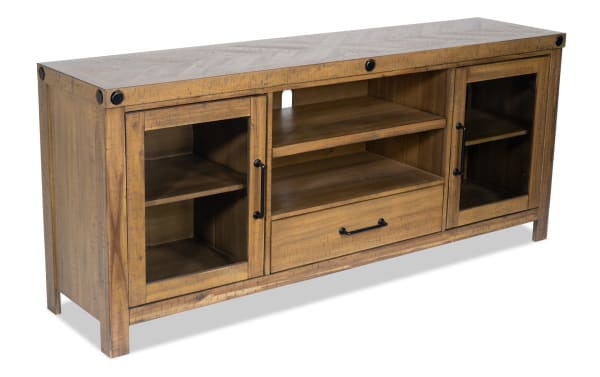 Rustic Sonoma 70'' natural wood TV stand with acacia veneer, glass doors, black hardware, two shelves, and center drawer for storage.