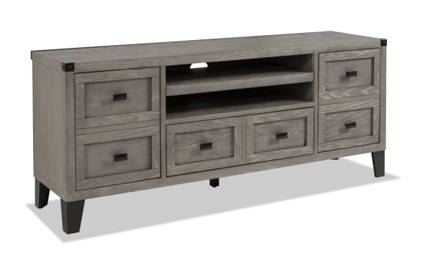 Wentworth 64'' gray transitional TV stand with poplar solid wood, MDF, metal accents, six drawers, and open center shelving for media storage.