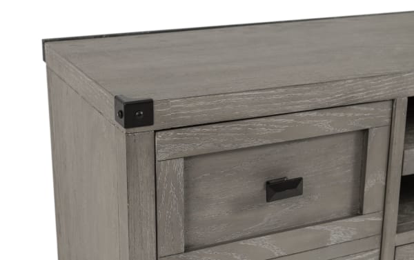 Wentworth 64'' gray transitional TV stand with poplar solid wood, MDF, metal accents, black corner protectors, and a drawer with black handle.