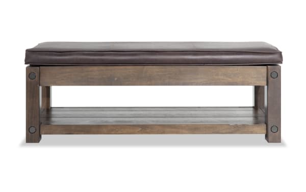 Sonoma Brown Leather Storage Bench with cushioned leather top, birch veneer frame, industrial style, and lower wood shelf for storage.