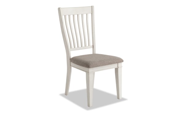 Rustic Montana White & Beige Slat Back Upholstered Dining Chair with beige polyester fabric seat, rubberwood solid frame, and traditional slat back design.