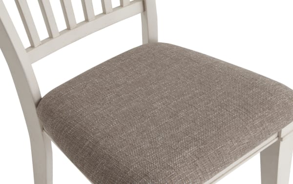 Beige fabric seat cushion on Montana White & Beige Slat Back Counter Height Stool, featuring rustic white wood frame and polyester upholstery.