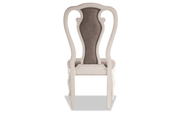 Scarlett White & Beige Queen Anne Upholstered Dining Chair with distressed antique white MDF frame, beige polyester fabric, carved legs, and tufted splat back.