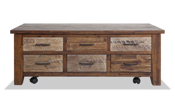 Rustic Relic Distressed Brown solid acacia wood coffee table with six iron-pull drawers, part of Relic Entertainment & Occasional collection.