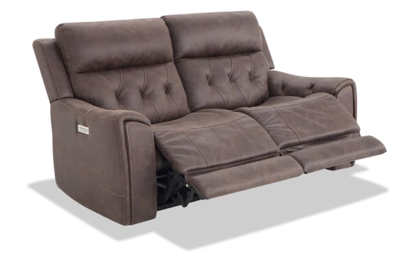 Canyon Walnut 70" power reclining loveseat in brown polyester fabric with power headrests, plush cushioning, and transitional style.