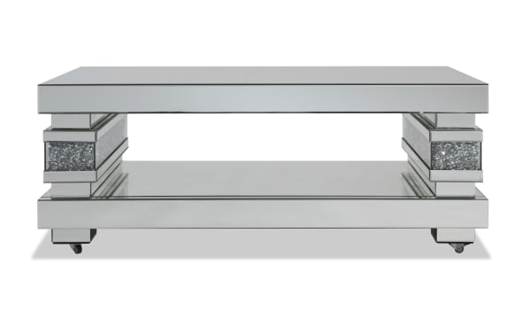 Glamour Silver Mirrored Coffee Table from Glamour Entertainment & Occasional collection, featuring MDF, tempered glass, faux crushed crystal inlay, beveled edges, and open shelving in a glam style.