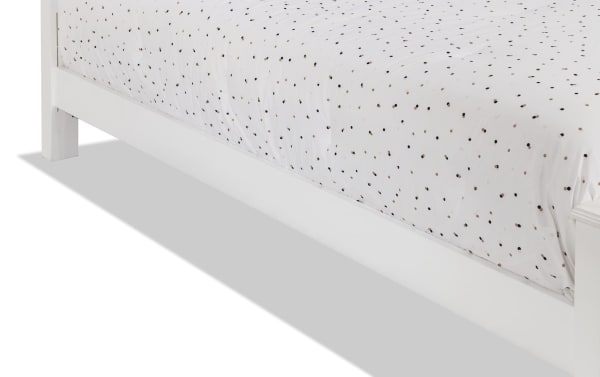 Full view of Madelyn Full White Upholstered Panel Bed with white polyester fabric and subtle tufting, featuring transitional style and poplar-pine solid frame.