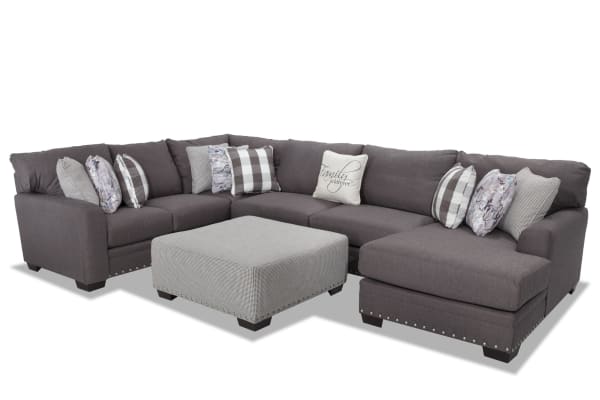 Cottage Chic Gray 150'' 4-piece right arm facing chaise sectional with ottoman, gray polyester fabric, traditional style, nailhead accents, includes 10 patterned and plaid accent pillows.