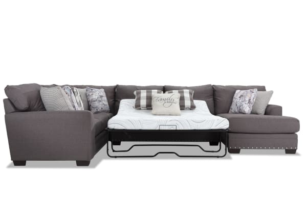 Cottage Chic 4-piece right arm facing gray polyester fabric sleeper chaise sectional with queen Bob-O-Pedic cooling gel memory foam mattress and nailhead trim.