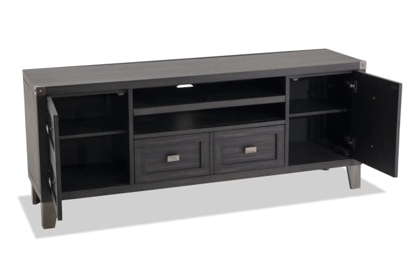 Wentworth 64'' black transitional TV stand with poplar solids, MDF, metal legs, two open shelves, two drawers, and two side cabinets for storage.