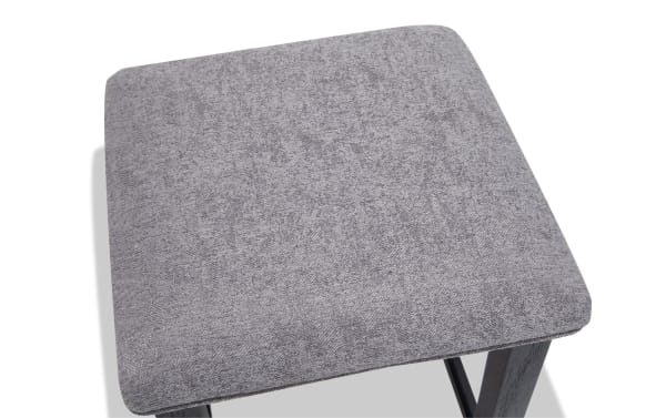 Contemporary Elevations Black & Gray Backless Upholstered Sofa Table Stool with gray polyester fabric seat and wire-brushed acacia wood legs.