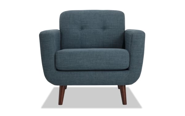 Bettie Teal Chair in mid-century modern style with teal polyester fabric, tufted back, track arms, and slender flared wooden legs.