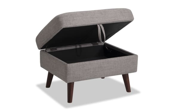 Mid-Century Modern Bettie Gray Storage Ottoman with gray polyester fabric, cushioned top, and lift-up seat revealing storage space.
