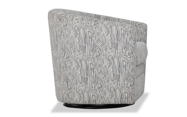 Mid-century modern Bettie Teal Swivel Chair in white and blue polyester fabric with geometric pattern, slope arms, and black swivel base.