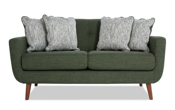 Bettie Avocado 65'' Loveseat in green polyester fabric with mid-century modern design, tufted seat back, track arms, wooden legs, and four patterned accent pillows.