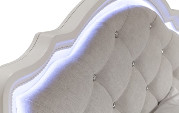 Madelyn Full White & Silver Upholstered Panel Bed with gray polyester fabric, tufted faux crystal buttons, accent lighting, and glam style.