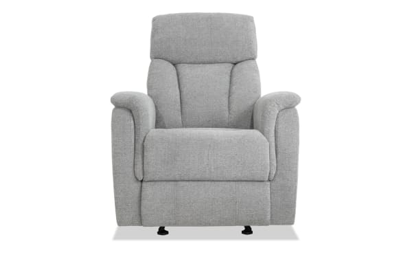 Transitional Brady Silver Manual Gliding Recliner in gray polyester fabric with plush padded arms and memory foam cushioning for comfort and relaxation.