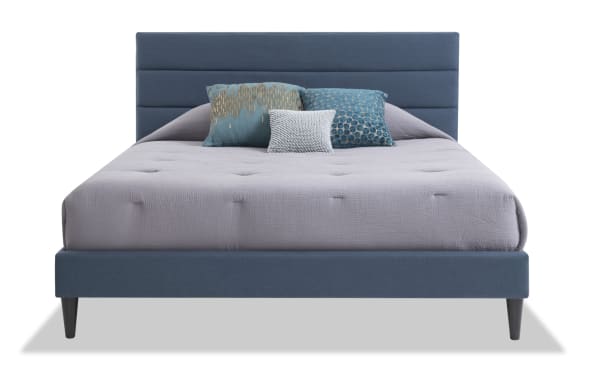 Lowell Full Blue Upholstered Platform Bed in polyester fabric with a transitional style, horizontal tufted headboard, and sturdy slat roll support.