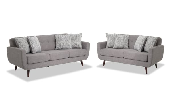 Bettie Gray 86'' Sofa & 65'' Loveseat set in mid-century modern style with gray 100% polyester fabric, tufted backs, track arms, wooden legs, and accent pillows.