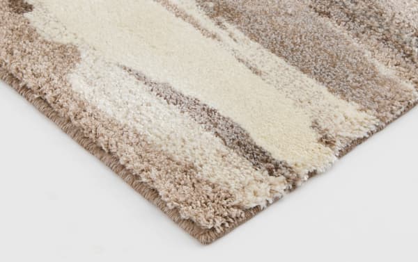 Beige Valley 8' x 10' abstract rug with organic neutral shapes, contemporary style, heat-set polypropylene fabric for durable, soft flooring.