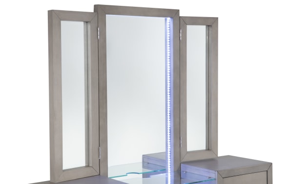 Contemporary Cosmopolitan Gray 6 Drawer Vanity Set with solid Acacia frame, LED-lit tri-fold mirrors, glass shelf, and silver hardware.