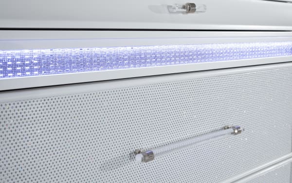 Glamour White 5 Drawer Chest from Glamour Bedroom collection featuring pearly white acacia veneer, mirrored crystal trim, acrylic handles, and LED lighting.